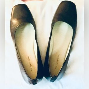 Leather (real), low heal, slip on, classic. Excellent used condition.